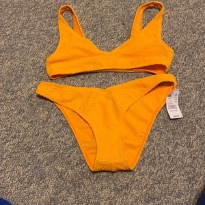La heart bathing suit brand new small and medium